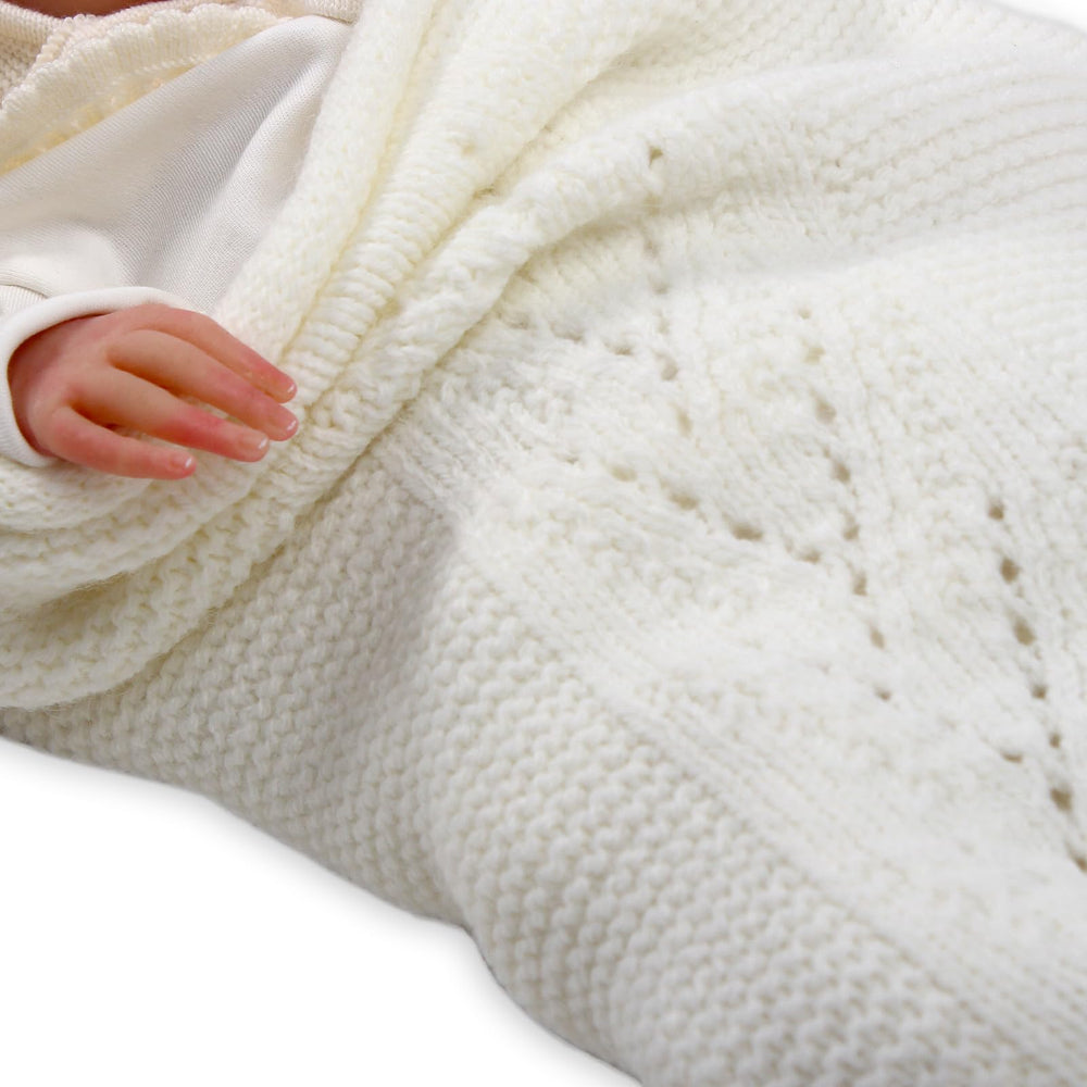 IDA KNITWEAR Swaddle Sack in ecru provides gentle, skin-friendly knit for restful naps.
