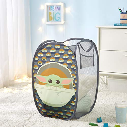 Idea Nuova star wars mandalorian hamper collapses flat for compact storage when not in use.