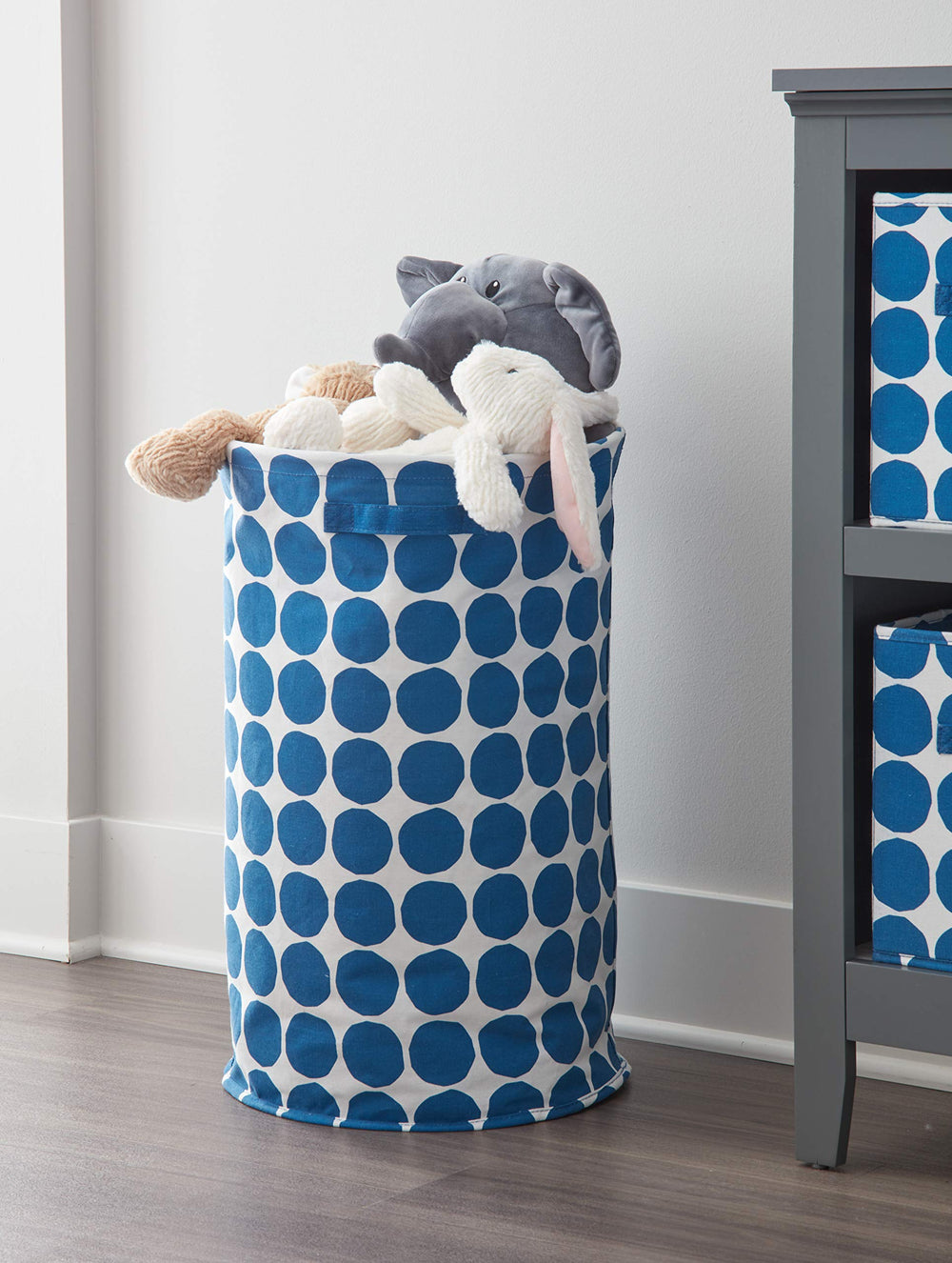 InterDesign iDesign Dot Round Storage Bin blue with dual handles for effortless transport.