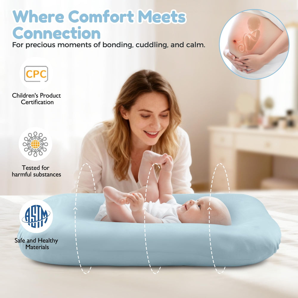 Idudbid baby lounger blue side profile demonstrates ergonomic support for supervised snuggles.