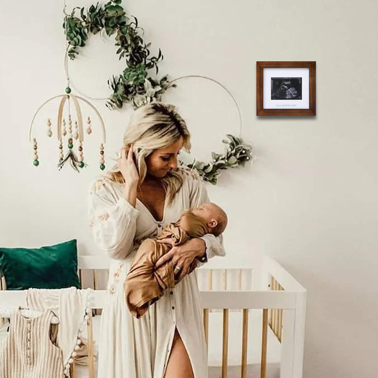 IHEIPYE frame mounted on wall showcases ultrasound pictures with timeless appeal