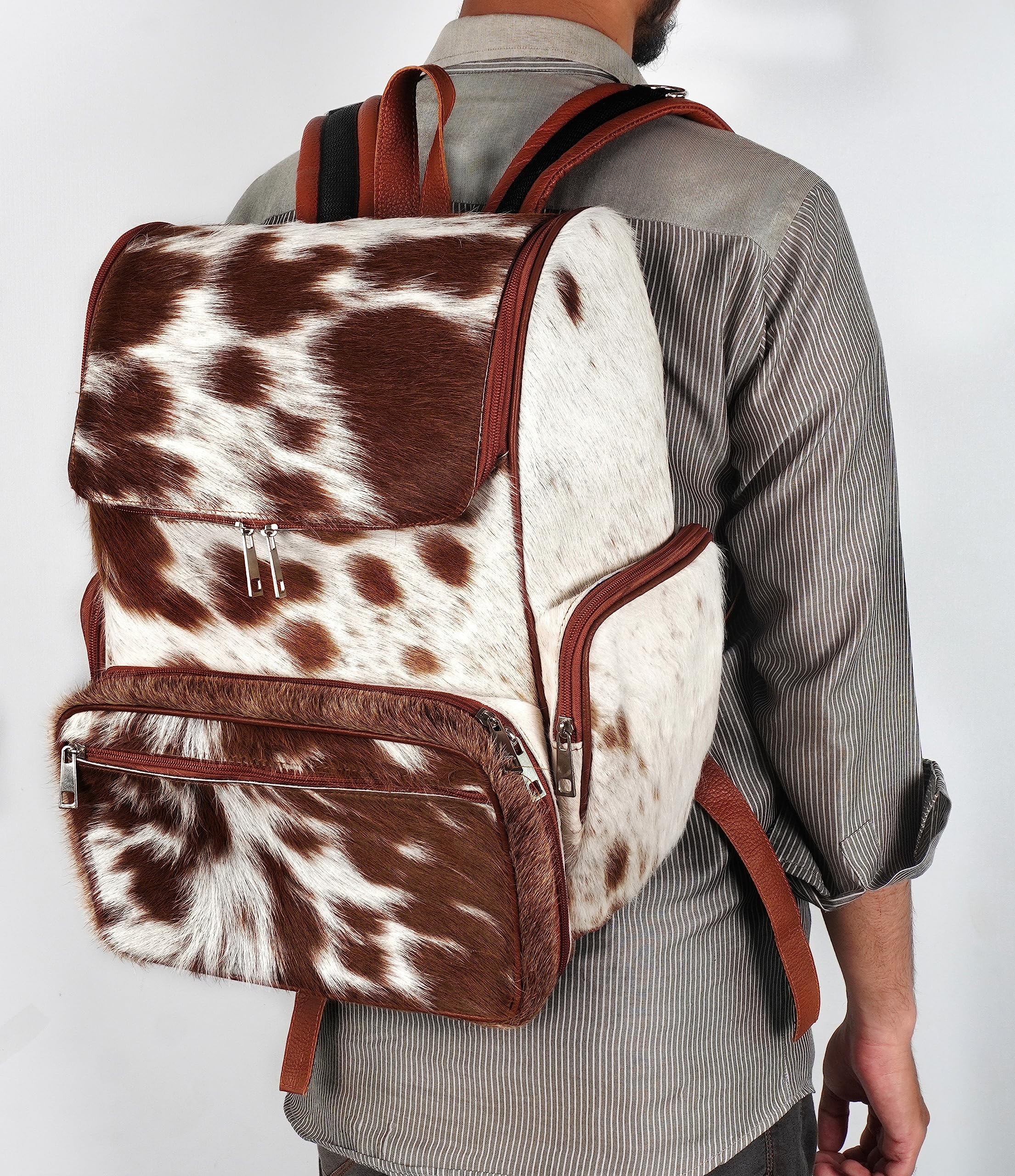 III-Fashions cowhide hair backpack dimensions show compact travel-friendly size.