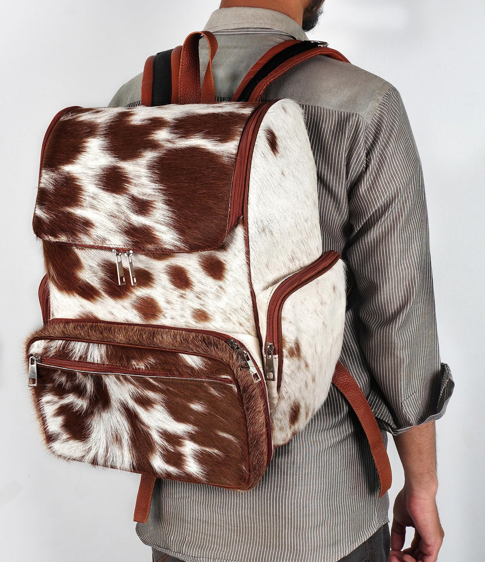 III-Fashions cowhide hair backpack dimensions show compact travel-friendly size.