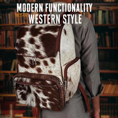 III-Fashions cowhide hair backpack interior reveals organized compartments and soft cotton lining.