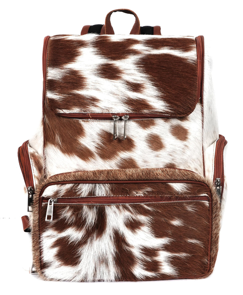 III-Fashions cowhide hair backpack side pocket highlights quick-access storage for essentials.