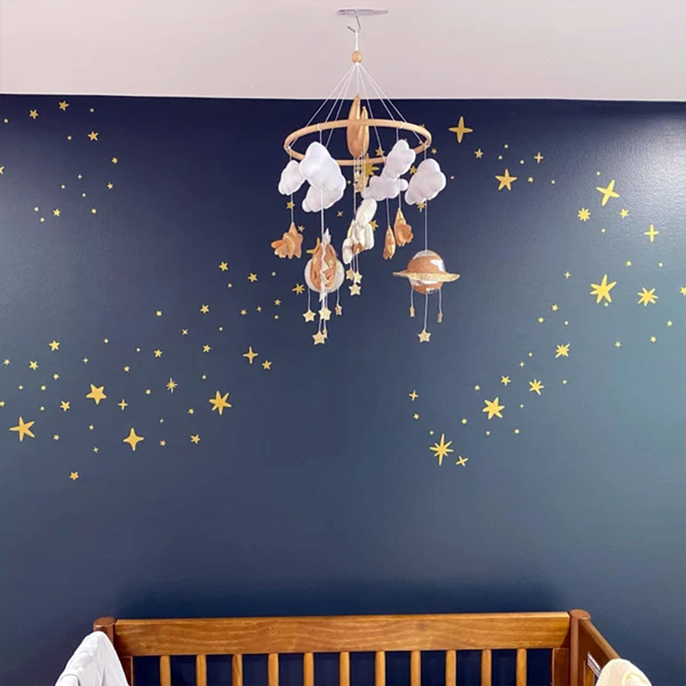 iinuu golden stars peel-and-stick application on wall with damage-free removal