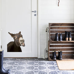 iinuu Laughing Donkey window sticker brightens a window with a witty touch.