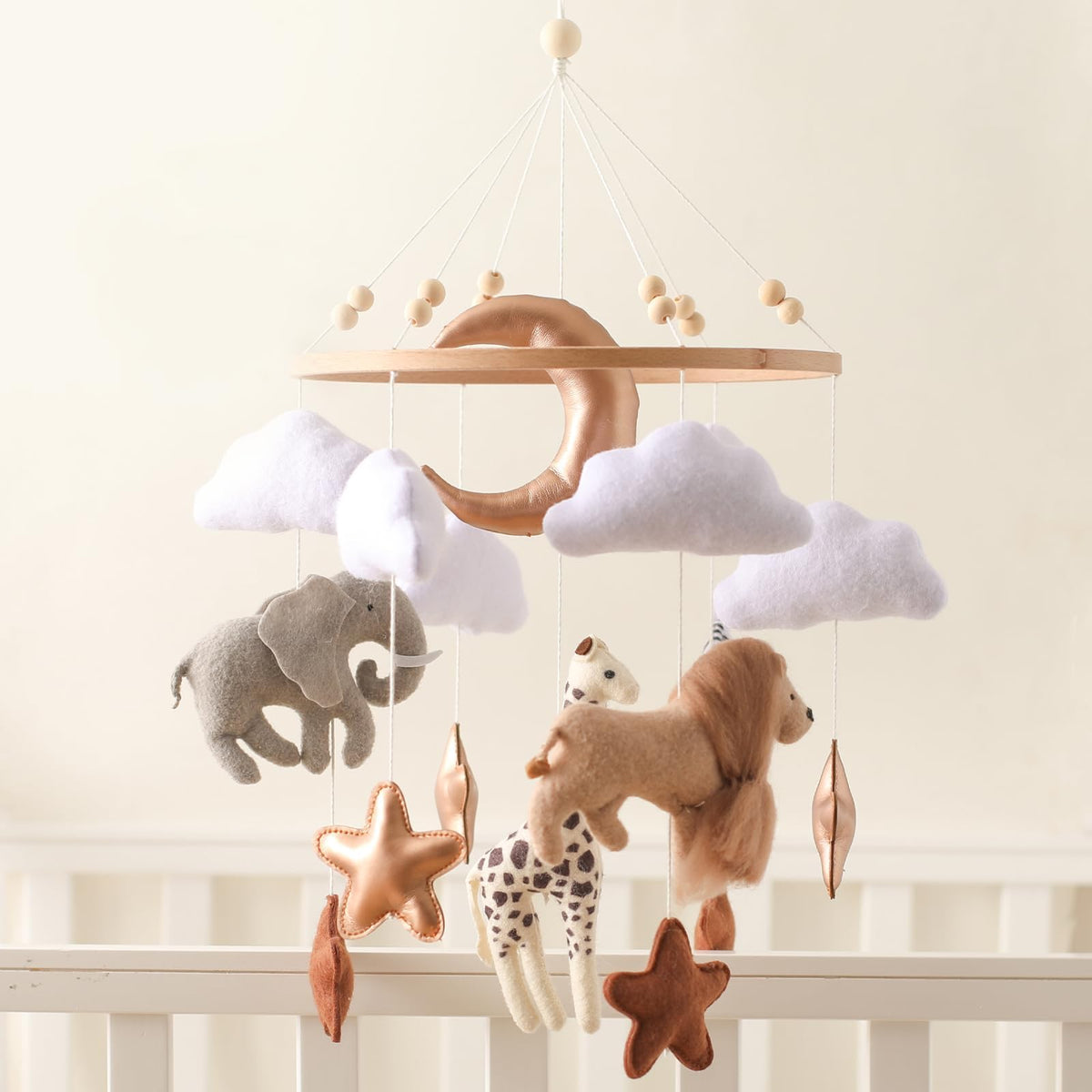 Ikubigu baby mobile for crib with wood elements enhances visual focus and soothing ambiance.
