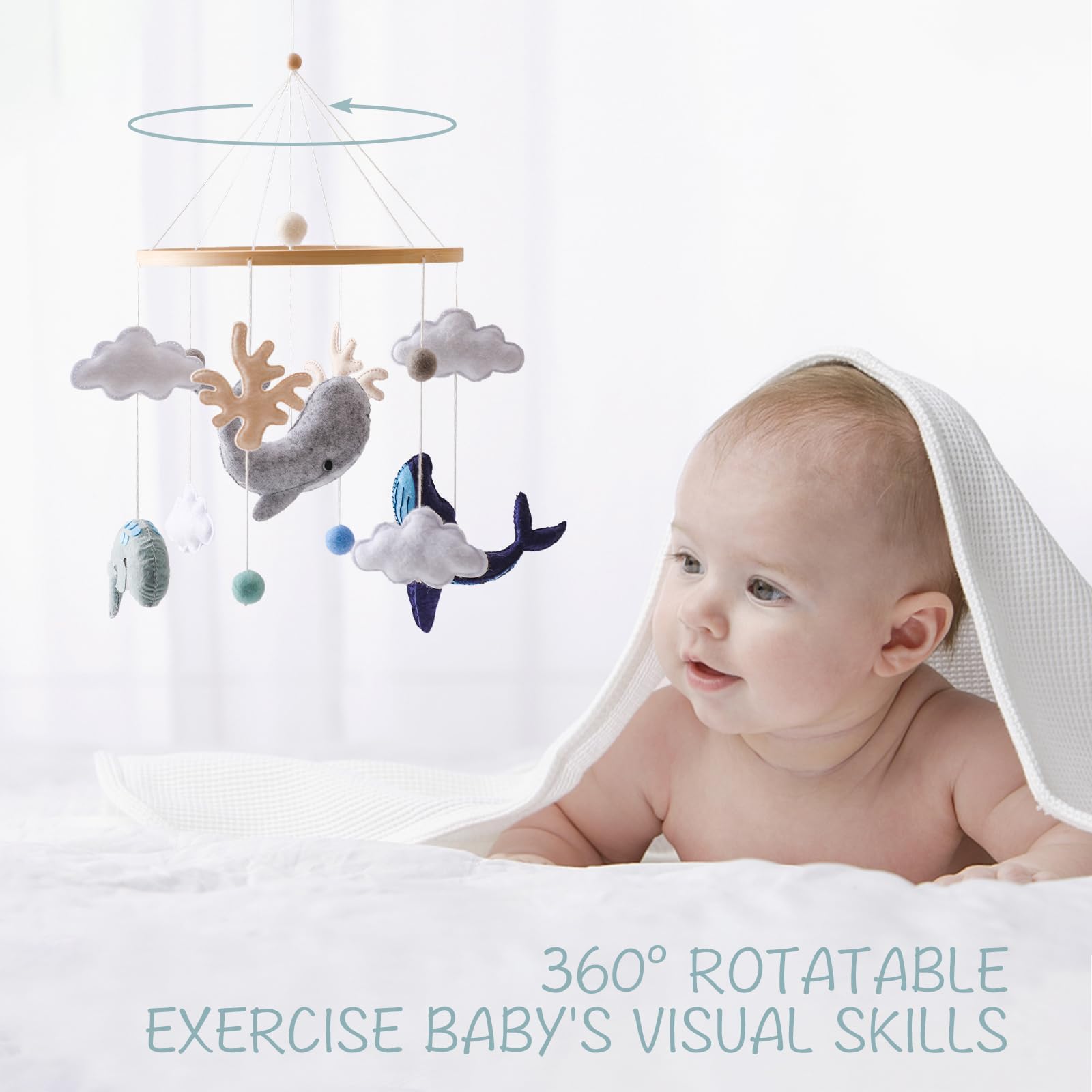 Ikubigu baby mobile felt balls closeup highlighting tactile textures for exploration.