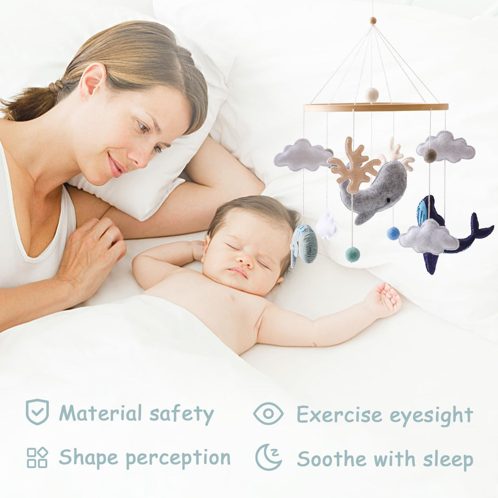 Ikubigu Montessori baby mobile white clouds adds gentle ceiling decor for bedtime.