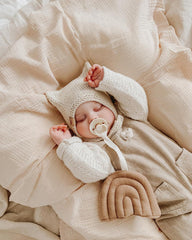 Meowcards Muslin Swaddle Blanket serves as a breathable stroller blanket for outings.
