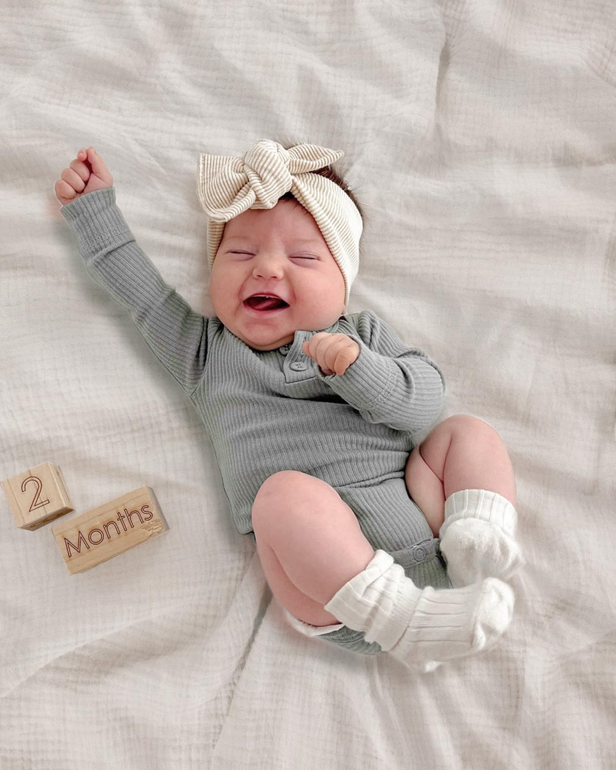 Meowcards Muslin Swaddle Blanket features breathable, lightweight fabric for comfortable days.