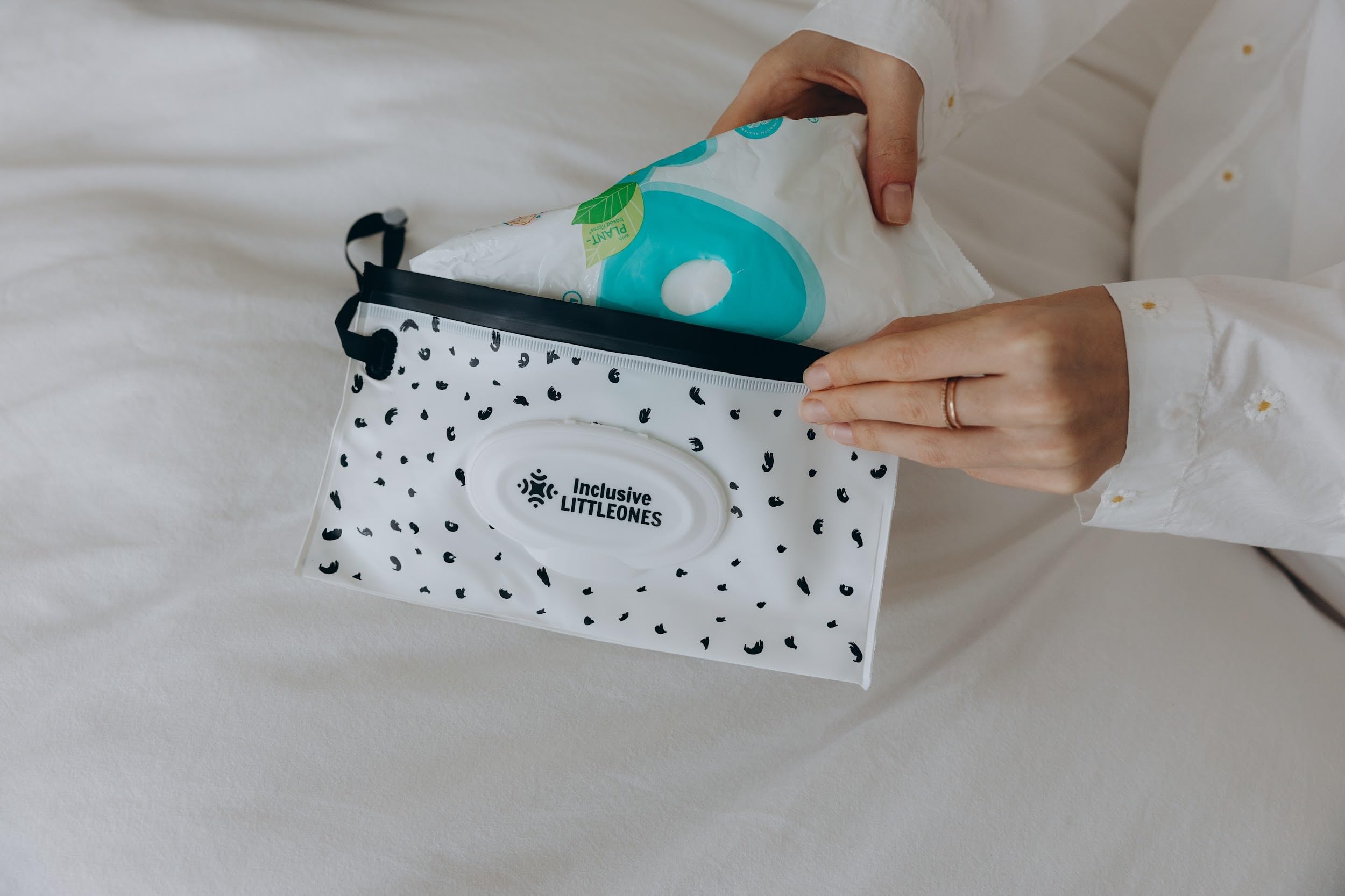 Inclusive LittleOnes pacifier case keeps pacifiers clean and within reach.