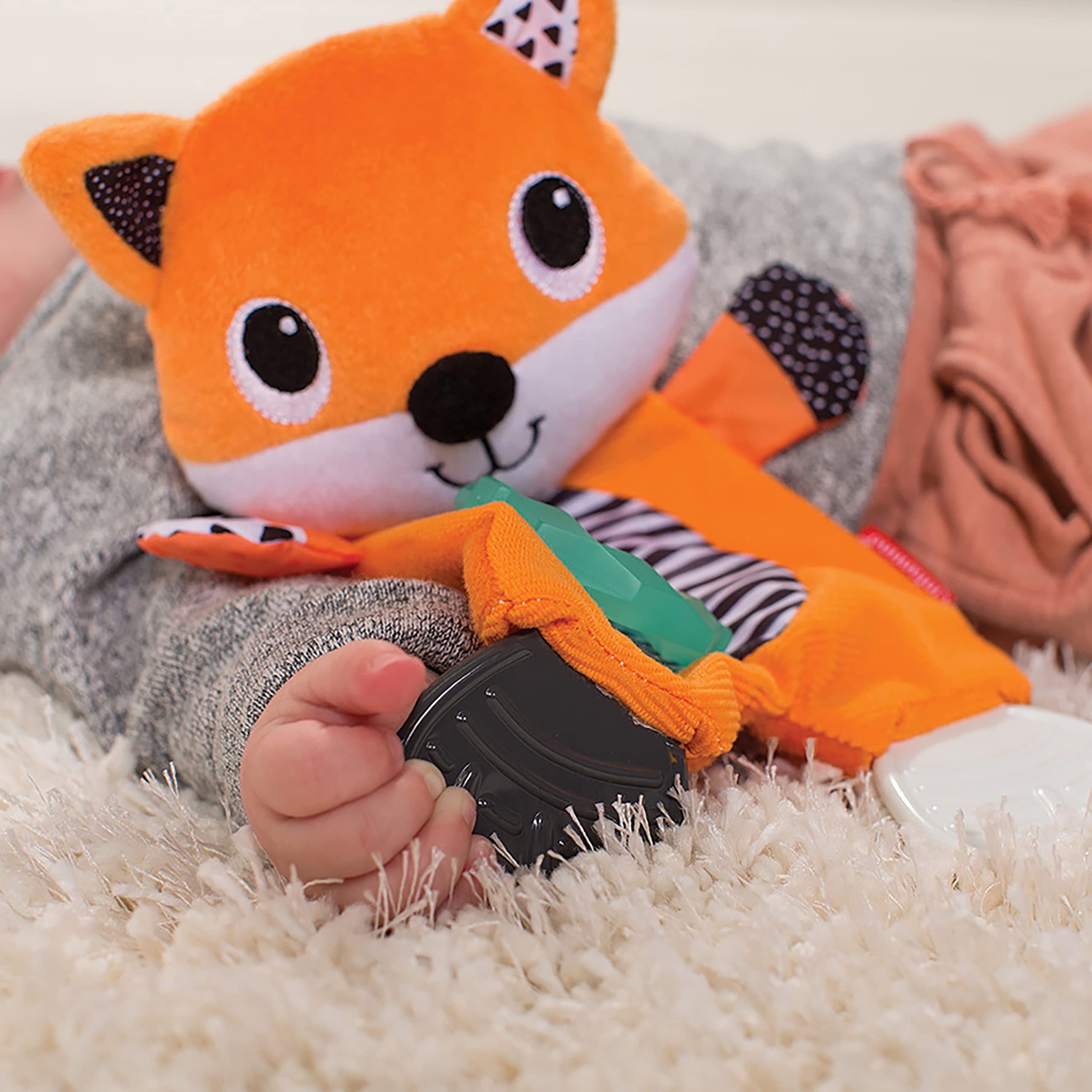 Infantino Cuddly Teether Fox close-up shows soft fabric for cuddling.
