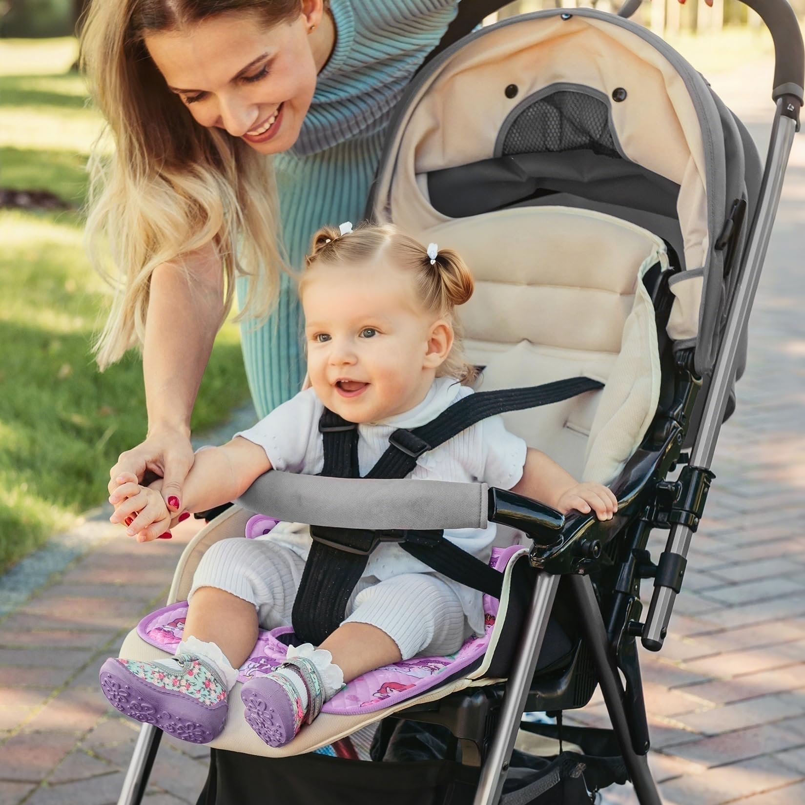 INFANZIA Dry Seat purple protector, folded, compact for storage and quick setup.