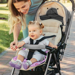 INFANZIA Dry Seat purple protector, folded, compact for storage and quick setup.
