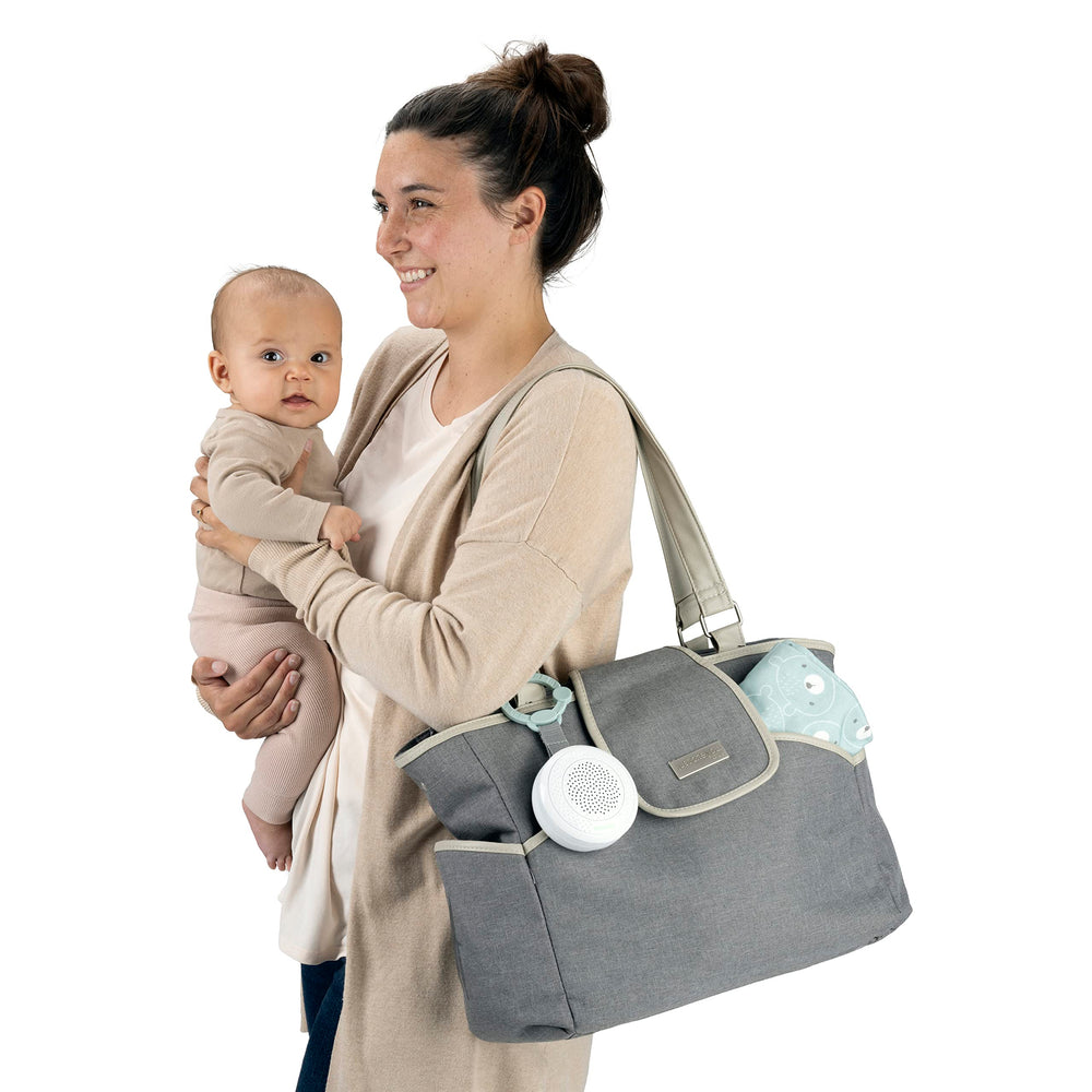 USB-rechargeable Pock-a-Bye soother shown charging for uninterrupted soothing sessions.