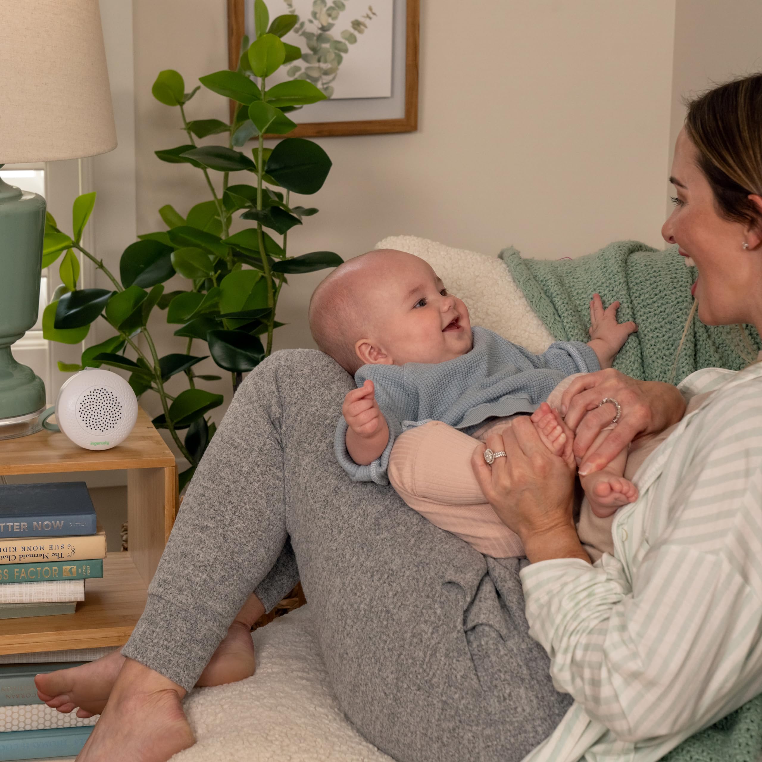Compact Pock-a-Bye soother shown with volume controls and track skipping for easy use.