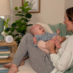 Compact Pock-a-Bye soother shown with volume controls and track skipping for easy use.