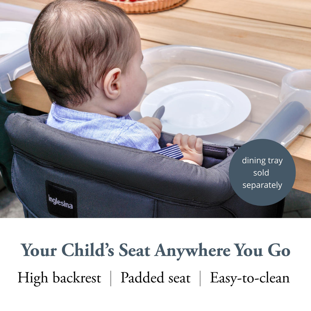 Inglesina Fast Table Chair attached to a table for stable dining surfaces.