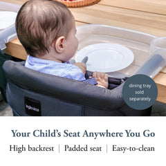 Inglesina Fast Table Chair attached to a table for stable dining surfaces.