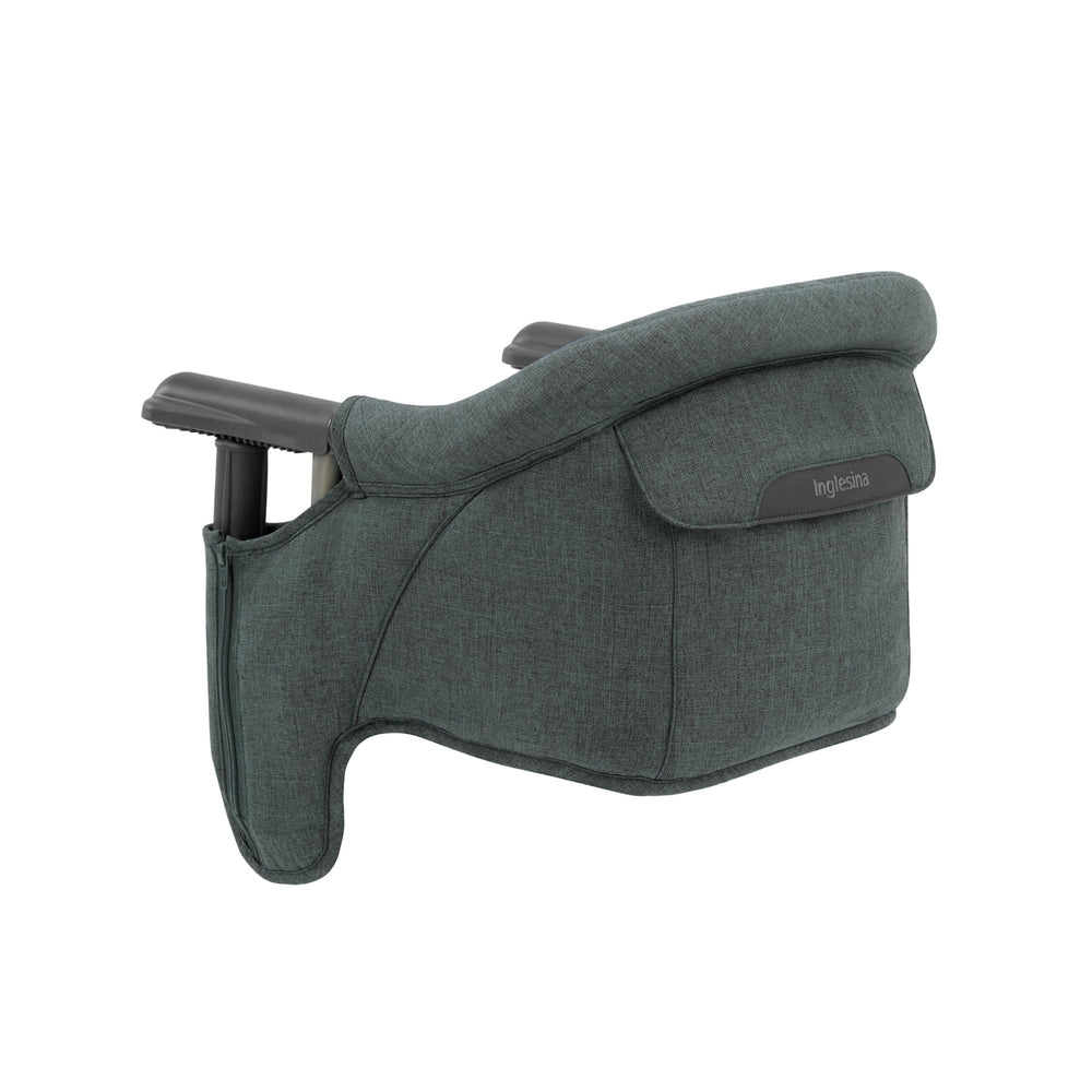 Inglesina Fast Table Chair folded compact for easy storage and travel.