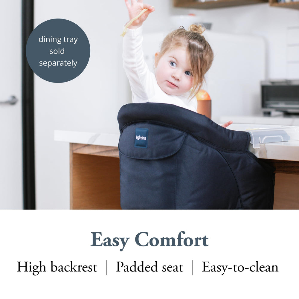 Inglesina Fast Table Chair Navy padded seat for cozy seating at the table.