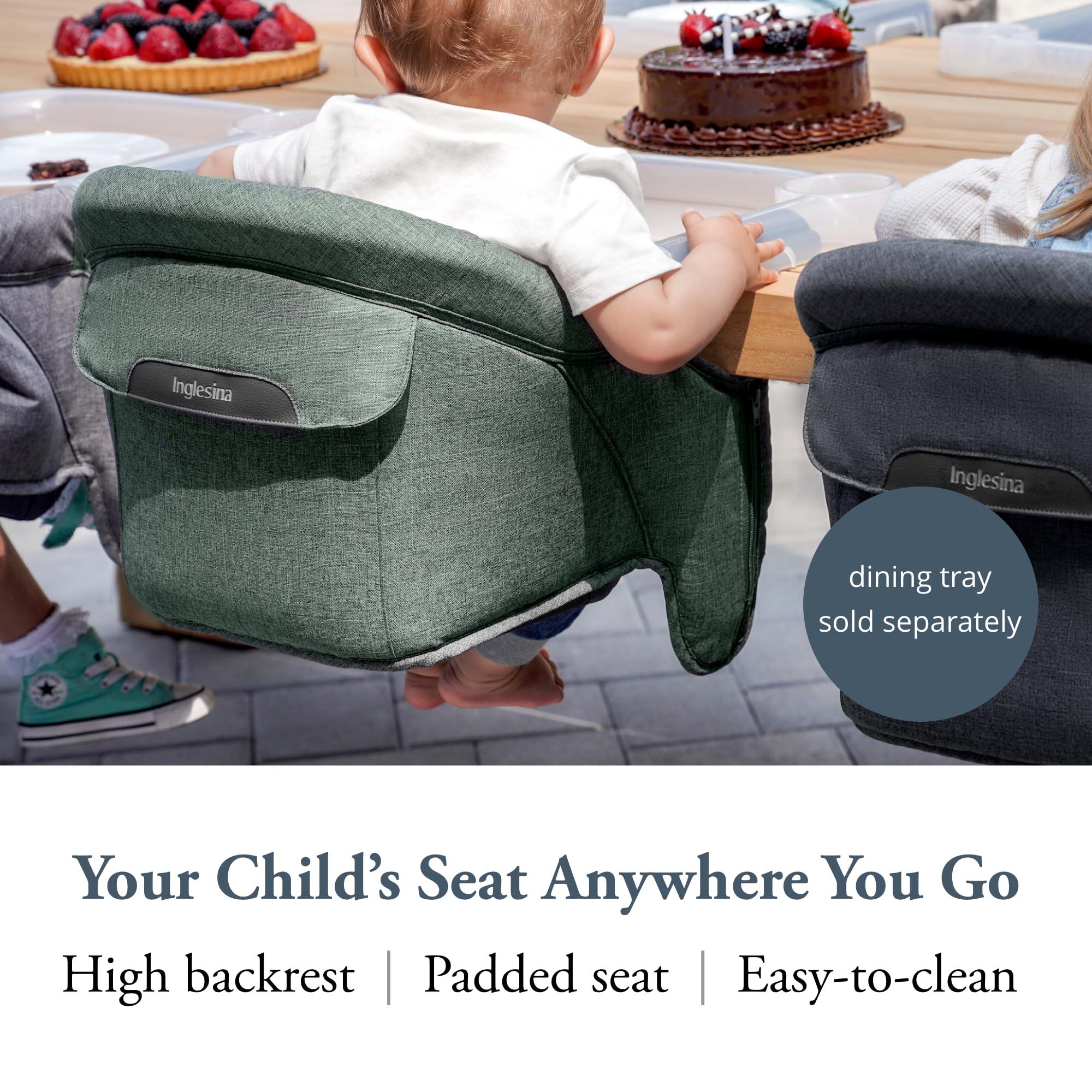 Inglesina Fast Table Chair Pine Green Melange attached to a table with secure clamp