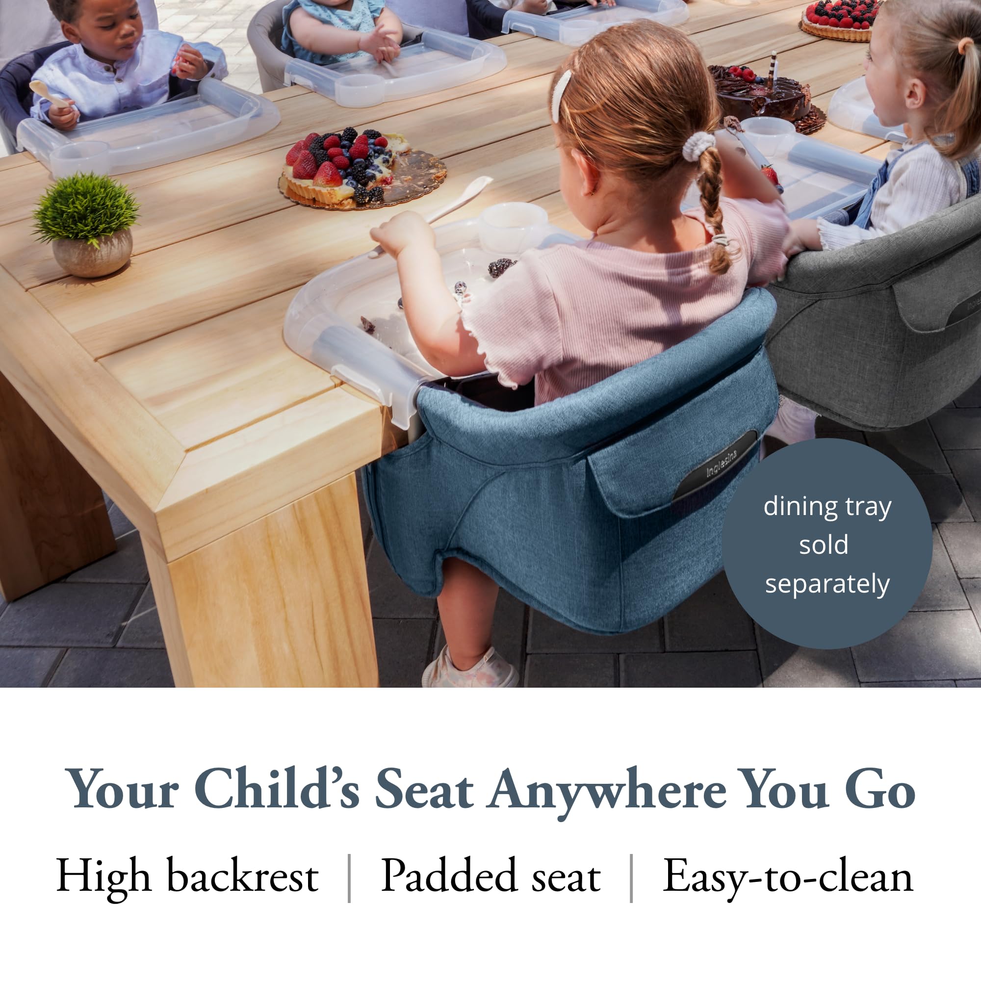 Inglesina Fast Table Chair attached to a table for convenient meals on the go.