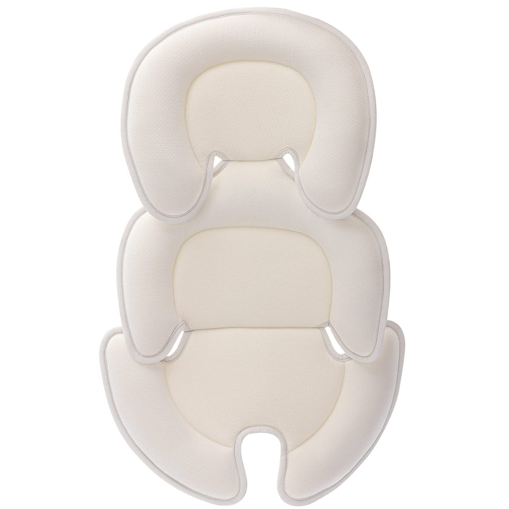 Innokids head-and-body-support-pillow in car seat providing a cozy cradle.