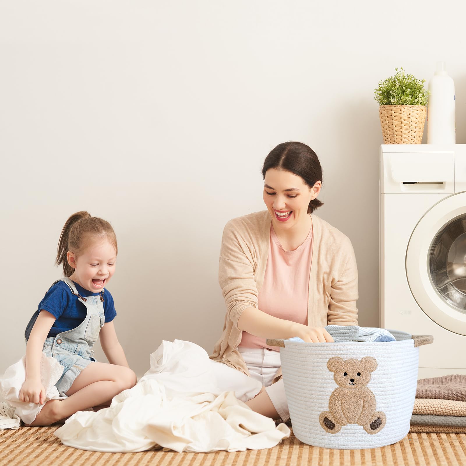 INough basket with beige lamb embroidery adds cozy nursery charm