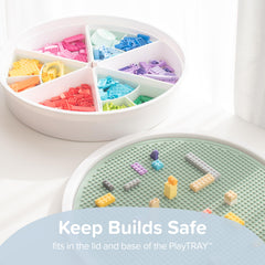 Inspire My Play travel-friendly roll-up baseplate demonstrates portability