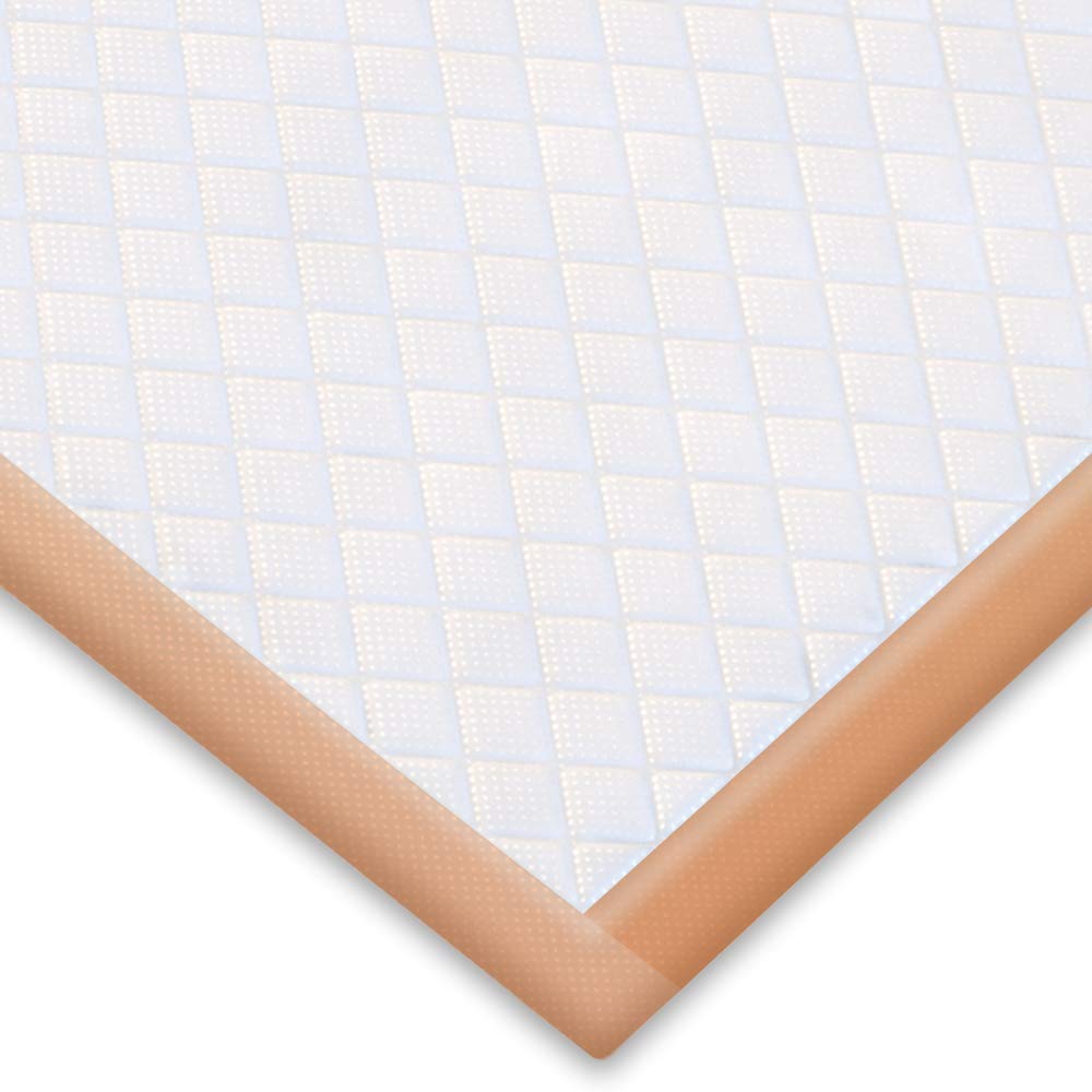Inspire XL bed pad in a bed-protection setup on sheets