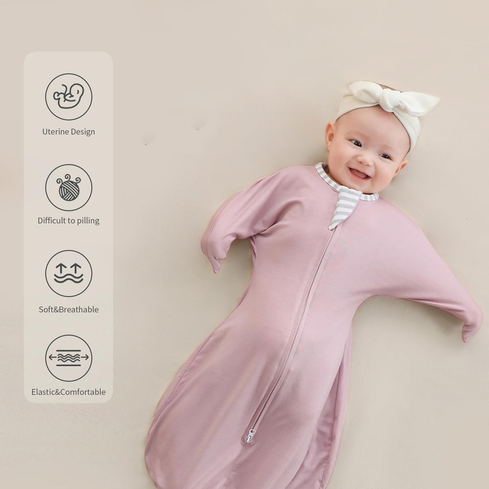 Chin-protective top zipper on Insular swaddle during changes.