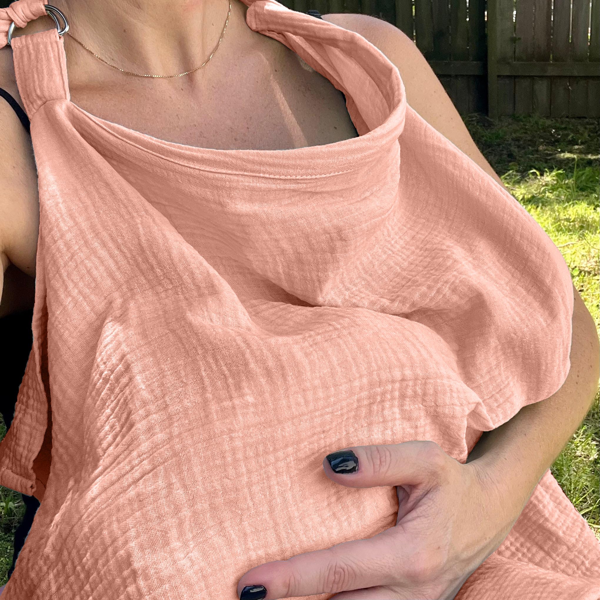 Insular nursing cover doubling as stroller canopy for daytime walks