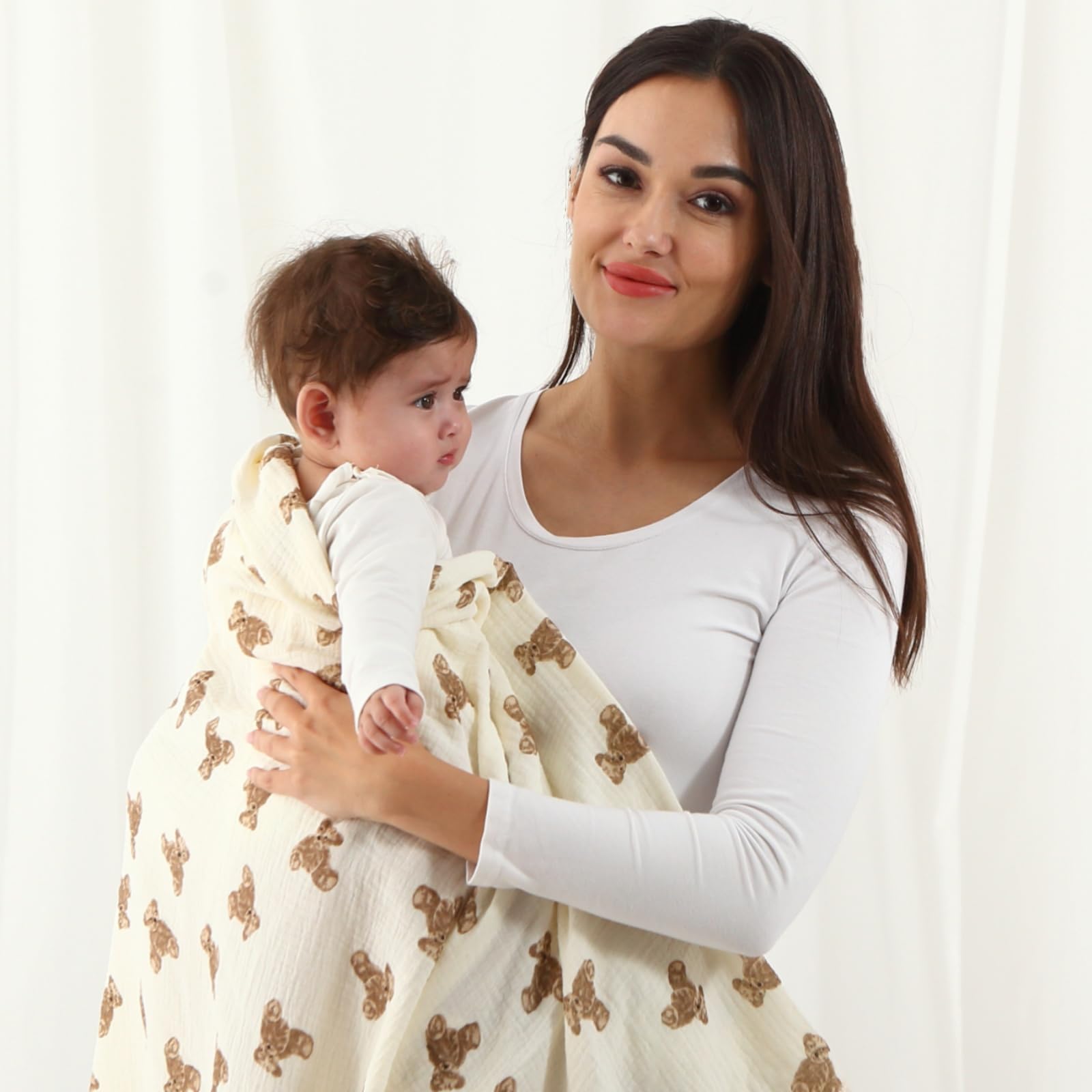 Insular floral-pattern muslin swaddle blanket with gender-neutral style