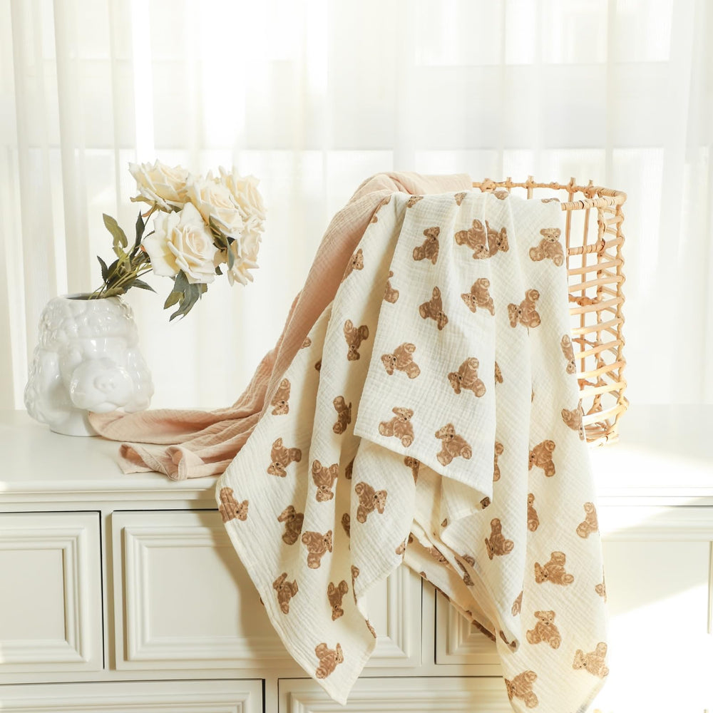 Insular muslin swaddle in use as a snug newborn wrap