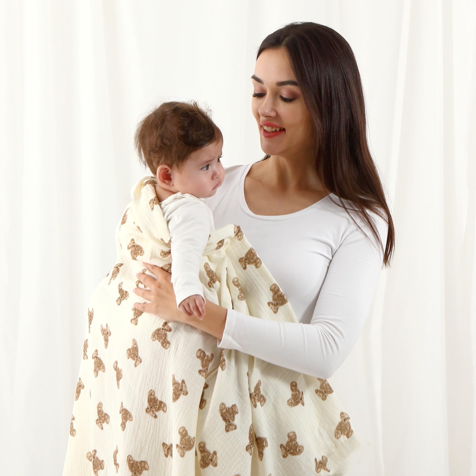 Insular muslin swaddle khaki-color 47x47 complements nursery decor.