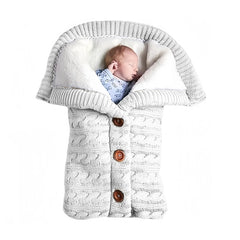 Insular warm baby sleeping bag with knitted wool exterior offers cozy warmth for winter outings.