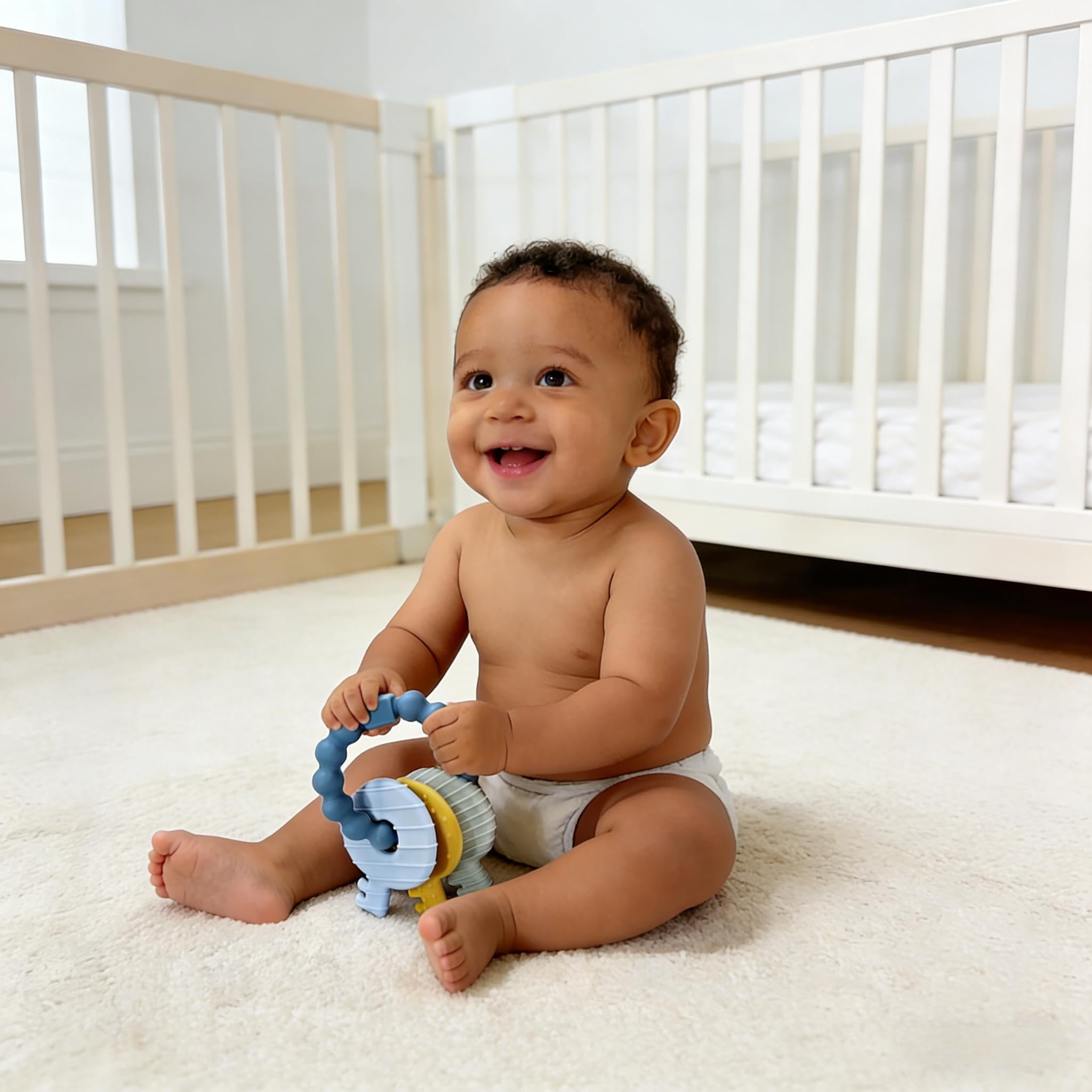Intatikoo Baby Keys Teether portable for on-the-go use with diaper bag or stroller.