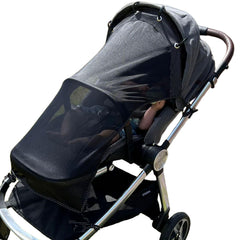 IntiMom stroller sun shade clip-on in action, quick secure attachment for universal fit.