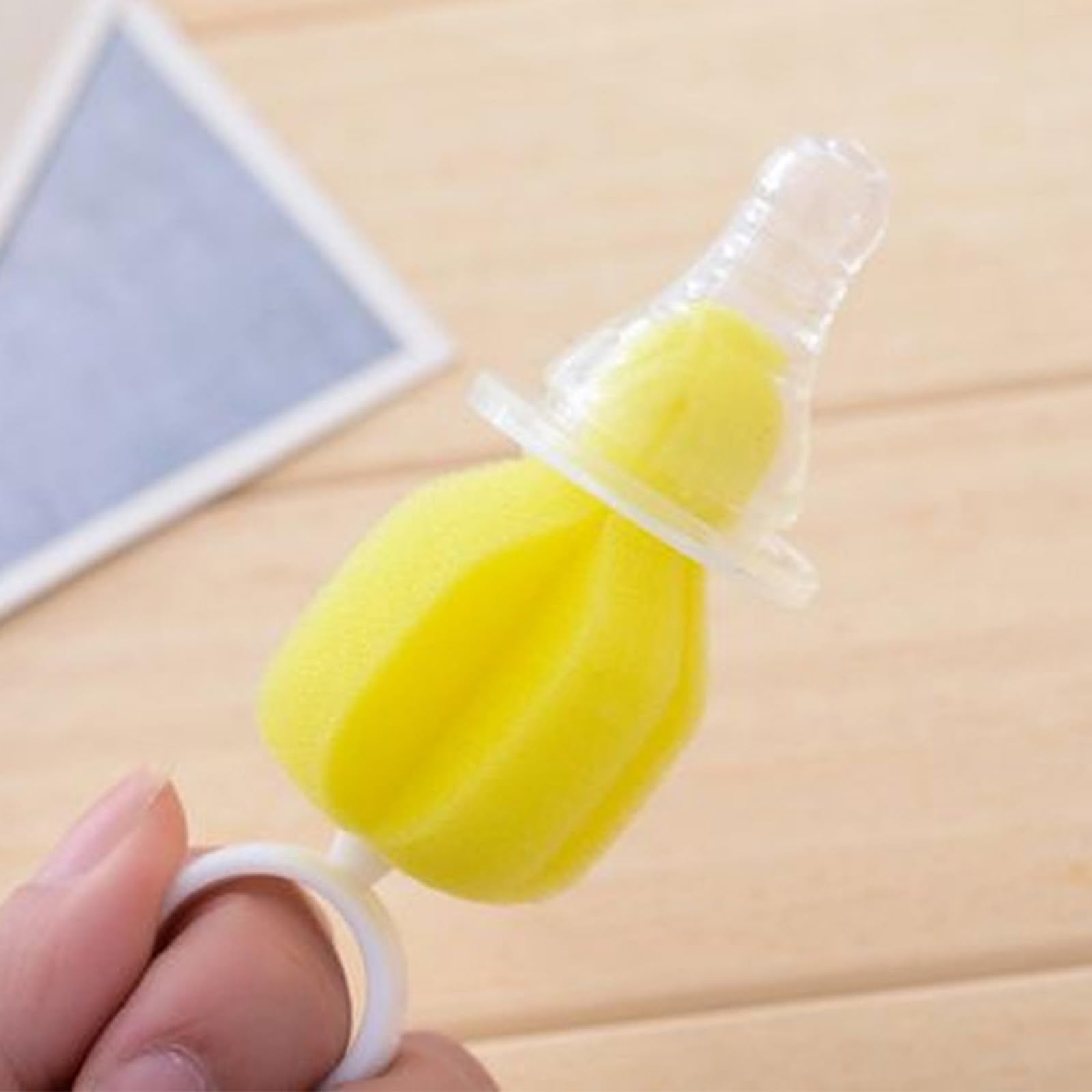 INVODA bottle brush multipurpose tool for bottles and lids.