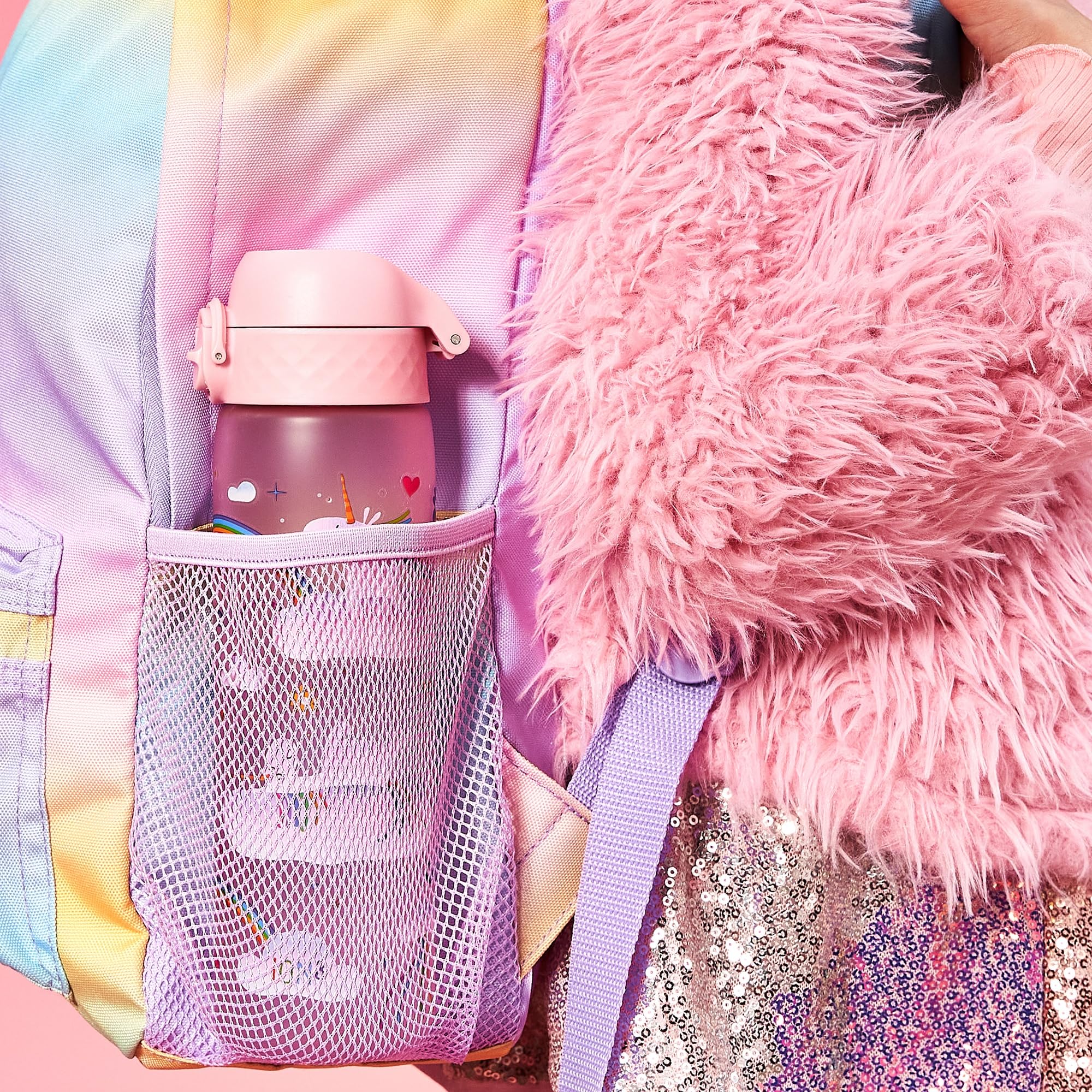 Ion8 slim bottle fits cup holders and backpacks for travel.