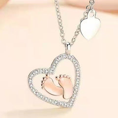 IPINK mom-to-be necklace pendant close-up showing the heart detail