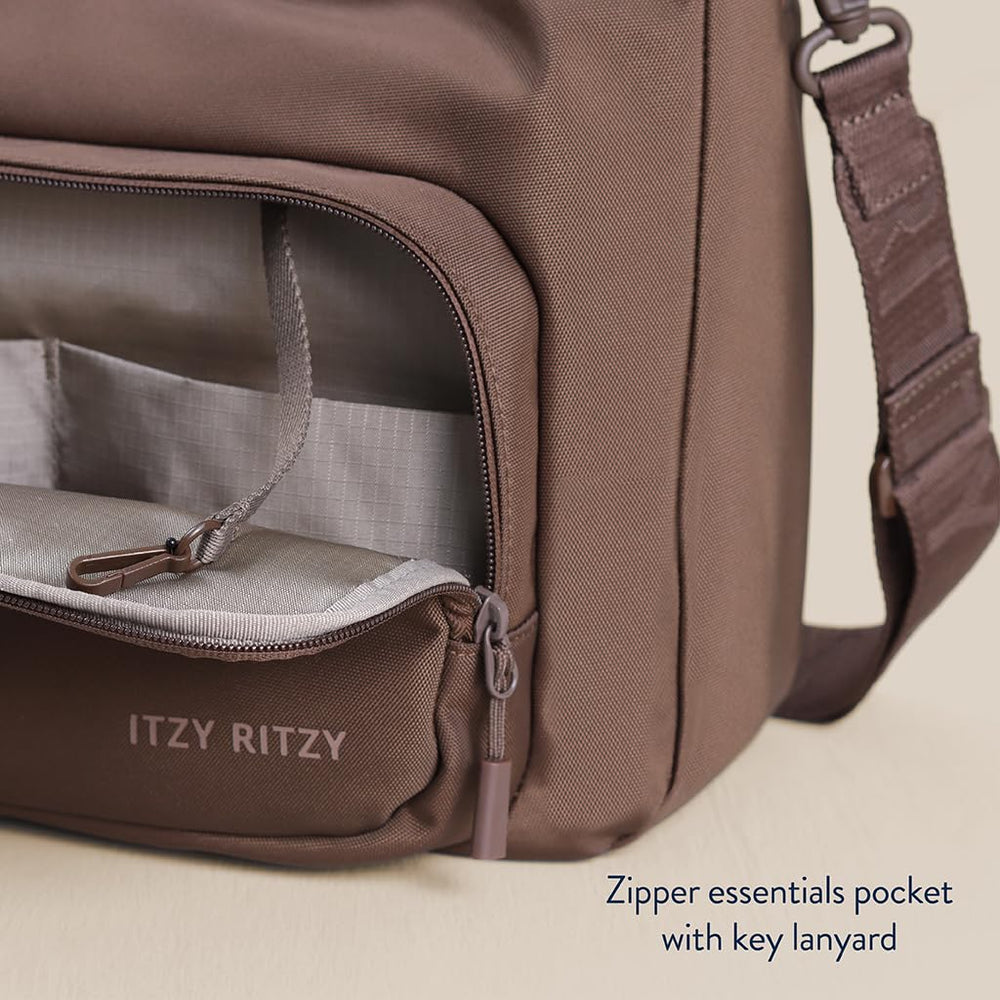 Itzy Ritzy Belong Cargo Caddy stroller straps enable seamless hands-free transitions