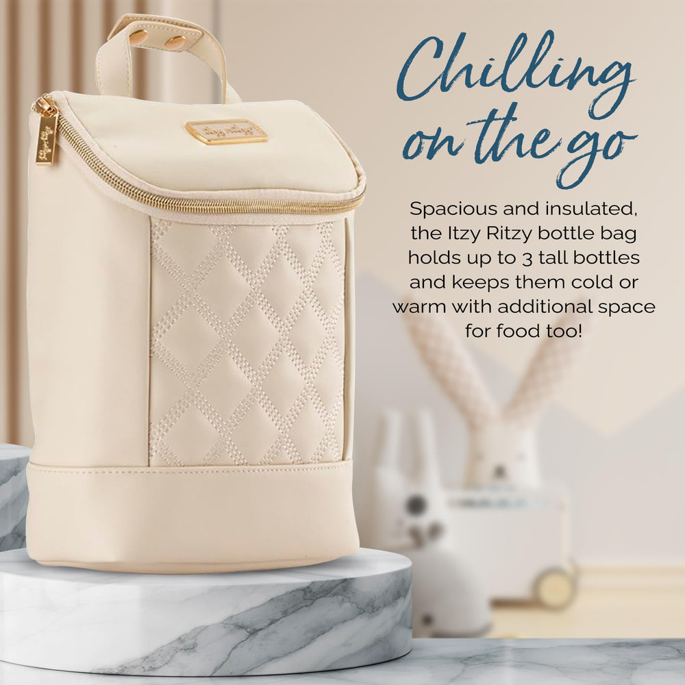 Itzy Ritzy bottle bag snaps to diaper bag for easy access.