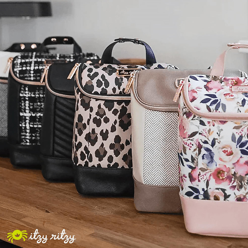 Itzy Ritzy insulated bottle bag secure zipper detail for safe transport.