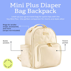 Itzy Ritzy Mini Plus Backpack wipeable changing pad ready for quick changes.