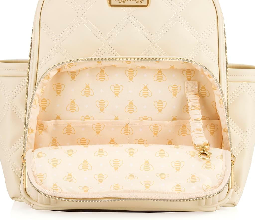 Itzy Ritzy Mini Plus Backpack gender-neutral design suitable for any caregiver.