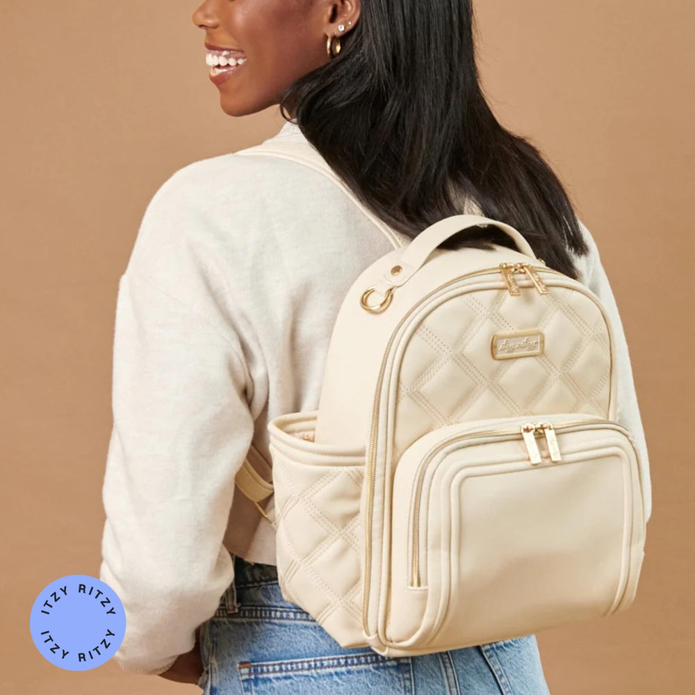 Itzy Ritzy Mini Plus Backpack 10-pocket organization for easy packing.